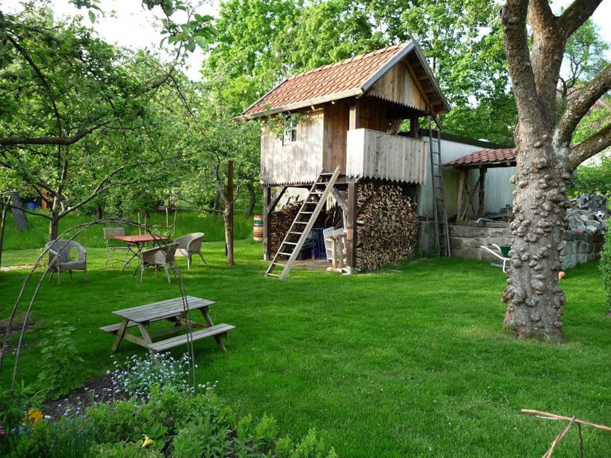 2 pillows in a tree garden hut airbnb